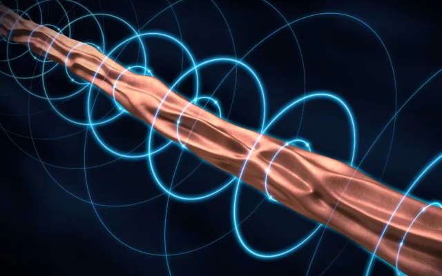 A graphic illustration shows a brownish-red rod being compressed to reveal fissures within it, with circular blue lines surrounding the rod as a way to show the inwardly-pinching electromagnetism.