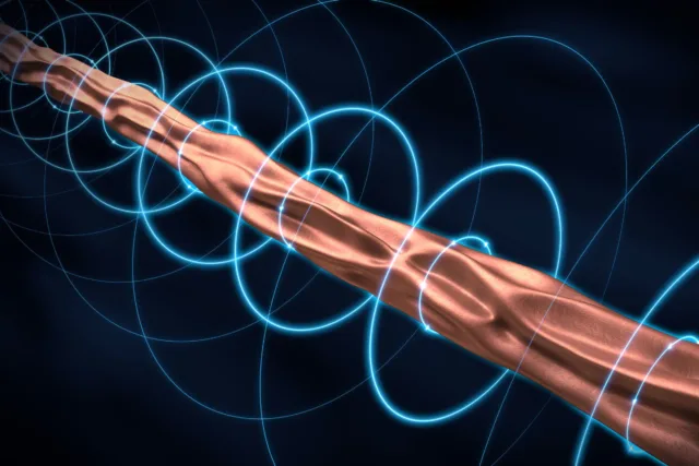 A graphic illustration shows a brownish-red rod being compressed to reveal fissures within it, with circular blue lines surrounding the rod as a way to show the inwardly-pinching electromagnetism.